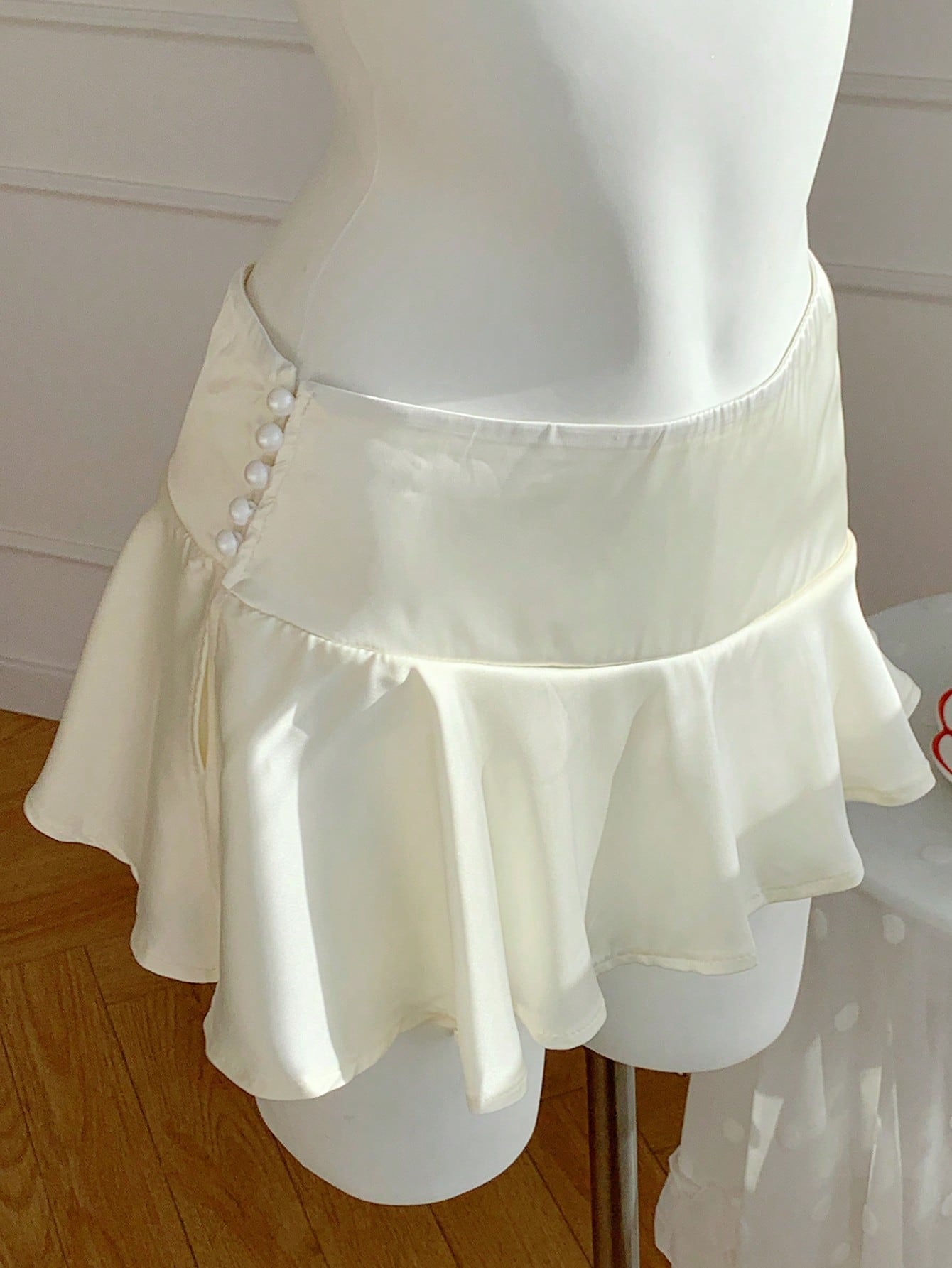Ezwear Women'S Solid Color Ruffle Hem Mini Skirt with Faux Pearl Button